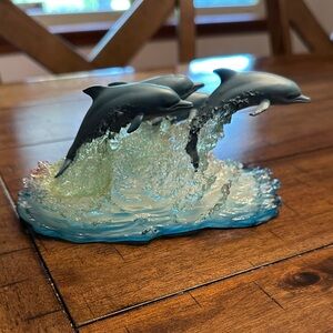 Oceanic Dolphin Sculpture with Blue and White Waves